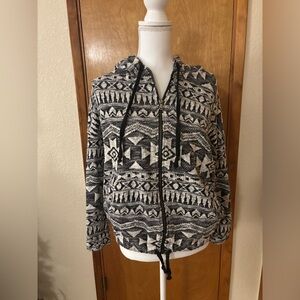 American Eagle Outfitters black and white Aztec print zip-up hoodie.